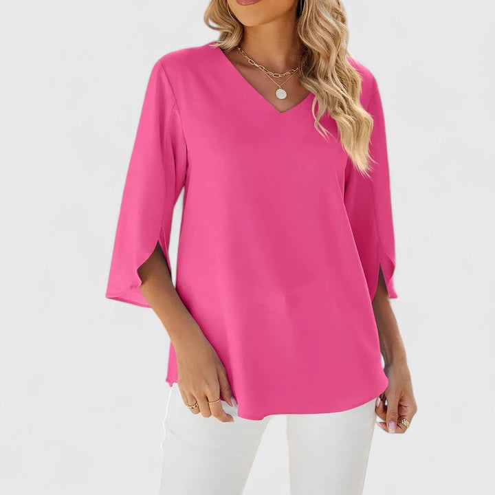 Elegant Debby blouse by Isabel y Miguel Madrid, featuring a stylish design with a relaxed fit, perfect for sophisticated looks.
