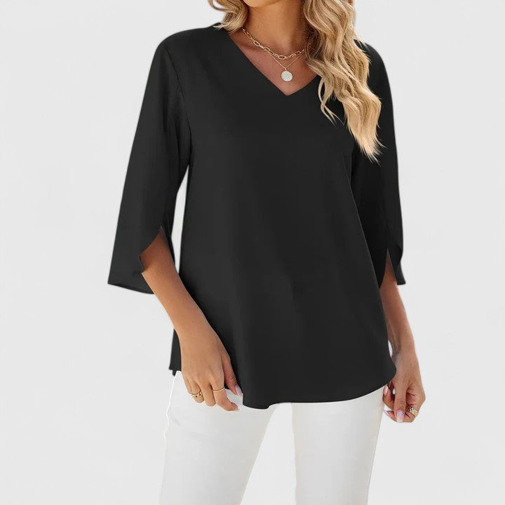 Elegant Debby blouse by Isabel y Miguel Madrid, featuring a stylish, flowy design with intricate details and a sophisticated fit.