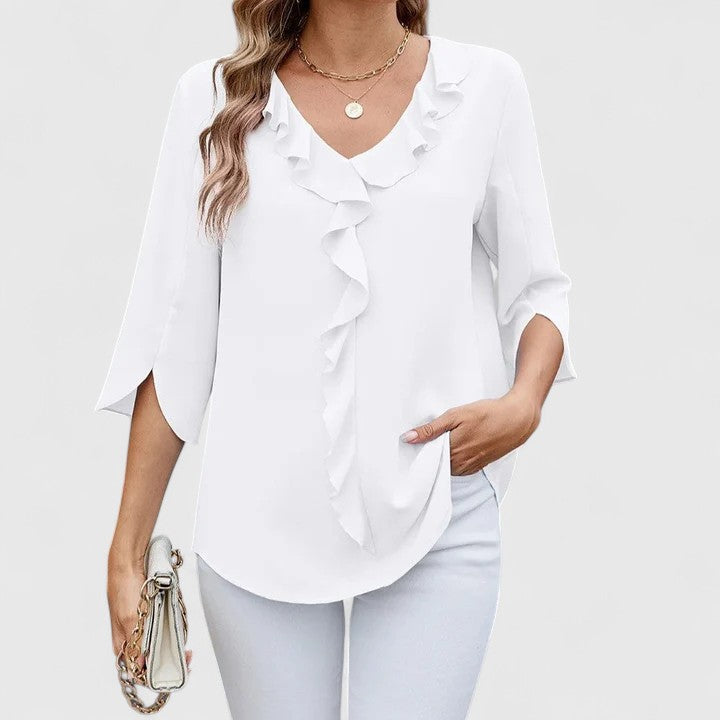 Debby elegant blouse by Isabel y Miguel Madrid, featuring a stylish design, soft fabric, and tailored fit suitable for formal occasions.