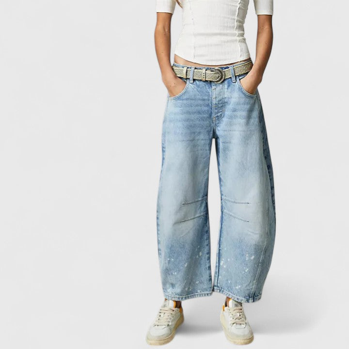 Pantalones amplios y cómodos de lluvia Isabel y Miguel Madrid, con tela resistente y diseño relajado para el clima húmedo.
