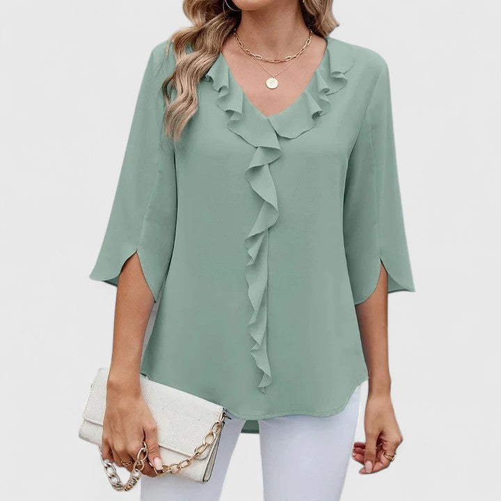 Elegant Debby blouse from Isabel y Miguel Madrid, featuring a stylish design with a sophisticated fit and fabric detail.