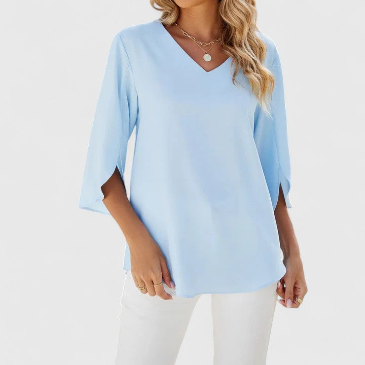 Debby elegant blouse by Isabel y Miguel Madrid featuring a stylish design and lightweight fabric, perfect for sophisticated looks.