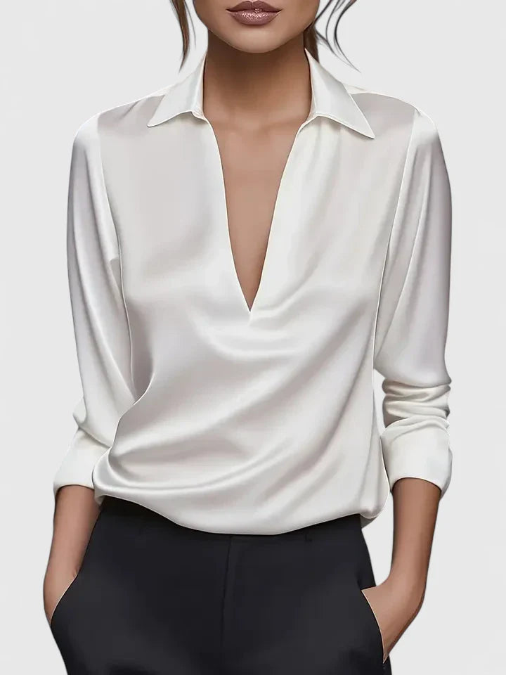 Elegant Isabel y Miguel Madrid Calvina blouse with sophisticated design, featuring stylish fabric and refined details.