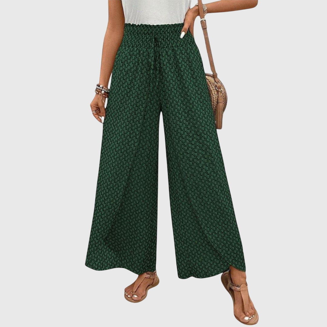 Pantalones Palazzo elegantes Chiara de Isabel y Miguel Madrid, con estilo sofisticado y corte amplio en color neutro.