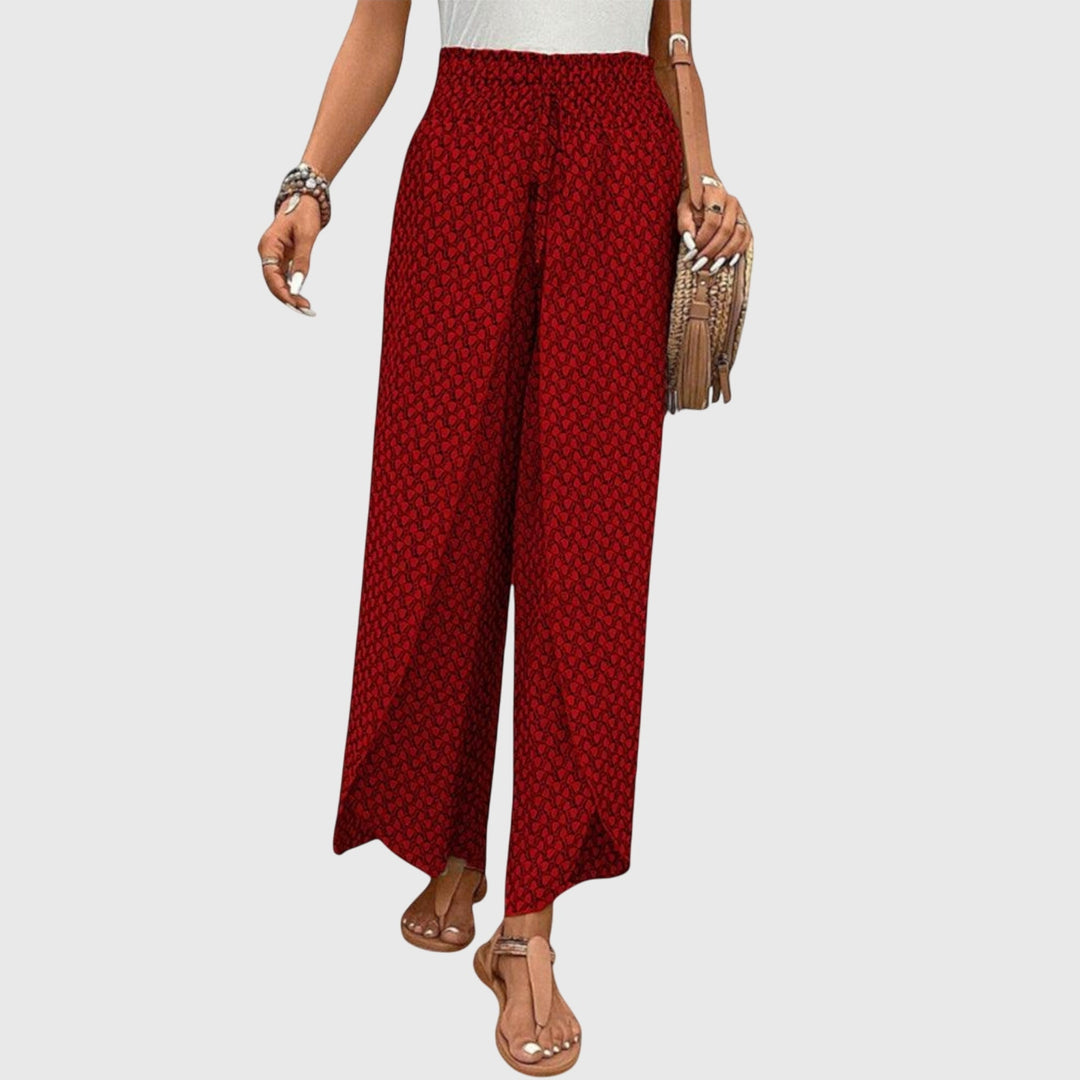 Pantalones palazzo elegantes Chiara de Isabel y Miguel Madrid, con tela fluida y diseño sofisticado en color neutro.