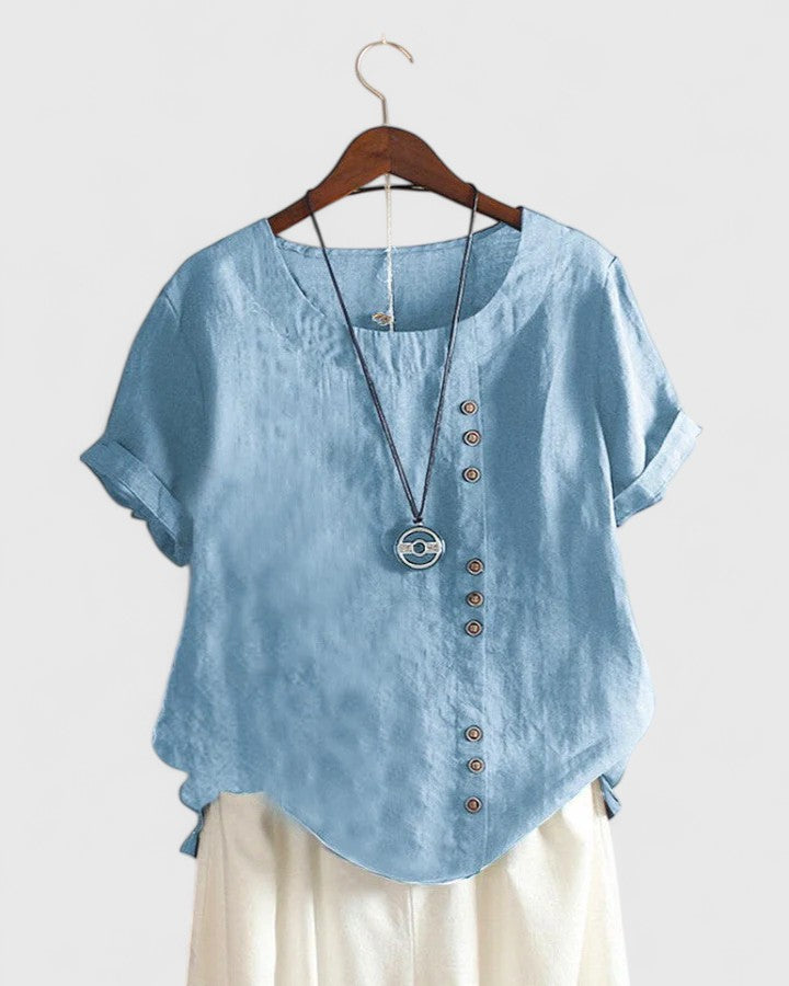 Elsavie short-sleeve blouse from Isabel y Miguel Madrid, featuring a soft blue color and casual fit for women.