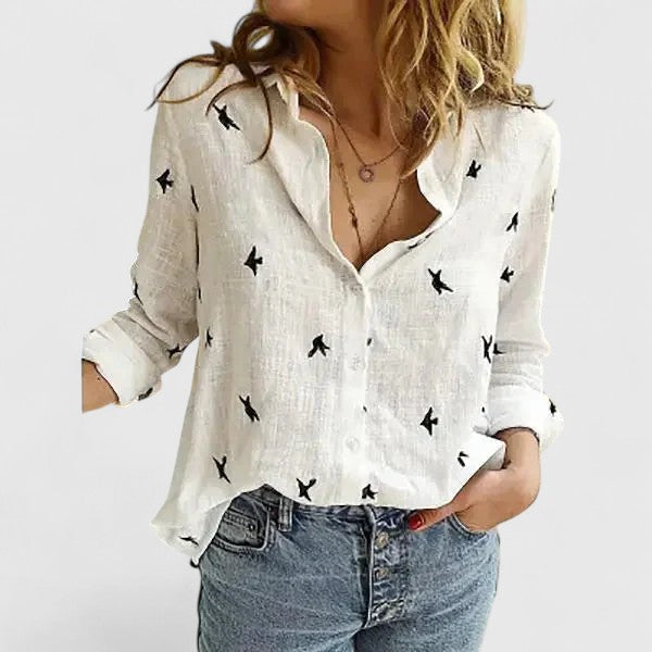 Isabel y Miguel Madrid Elena elegant cotton linen blouse, breathable and stylish, showcased in a close-up image.