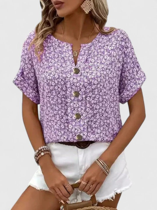 Floral summer top Sabine by Isabel y Miguel Madrid, featuring lightweight fabric and elegant design perfect for warm weather.
