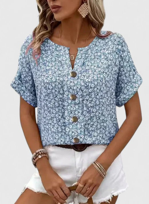 Isabel y Miguel Madrid Sabine elegant floral summer top, featuring vibrant colorful patterns and lightweight fabric.