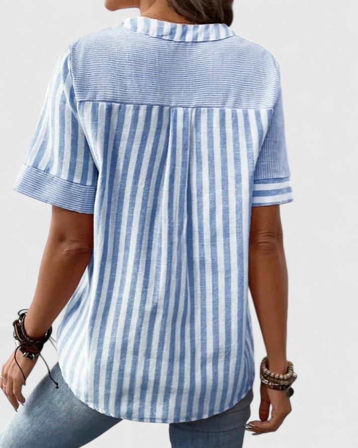 Isabel y Miguel Madrid Gigi sophisticated blouse in soft fabric, featuring elegant design and stylish details.