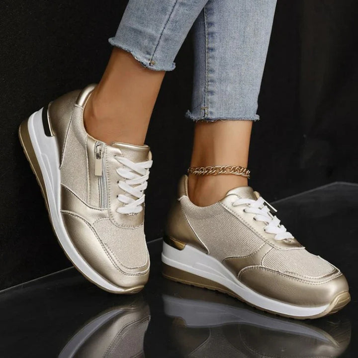 Isabel y Miguel Madrid women's orthopedic sneakers with laces and side zipper, featuring supportive sole and stylish design.
