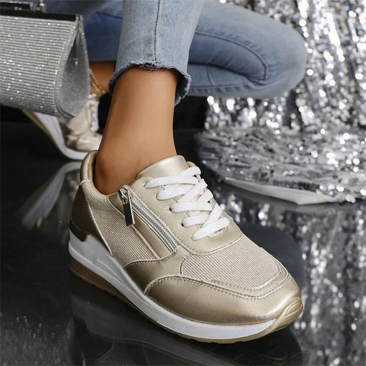 Women's orthopedic sneakers by Isabel y Miguel Madrid with laces and side zipper, showcasing comfortable supportive footwear.
