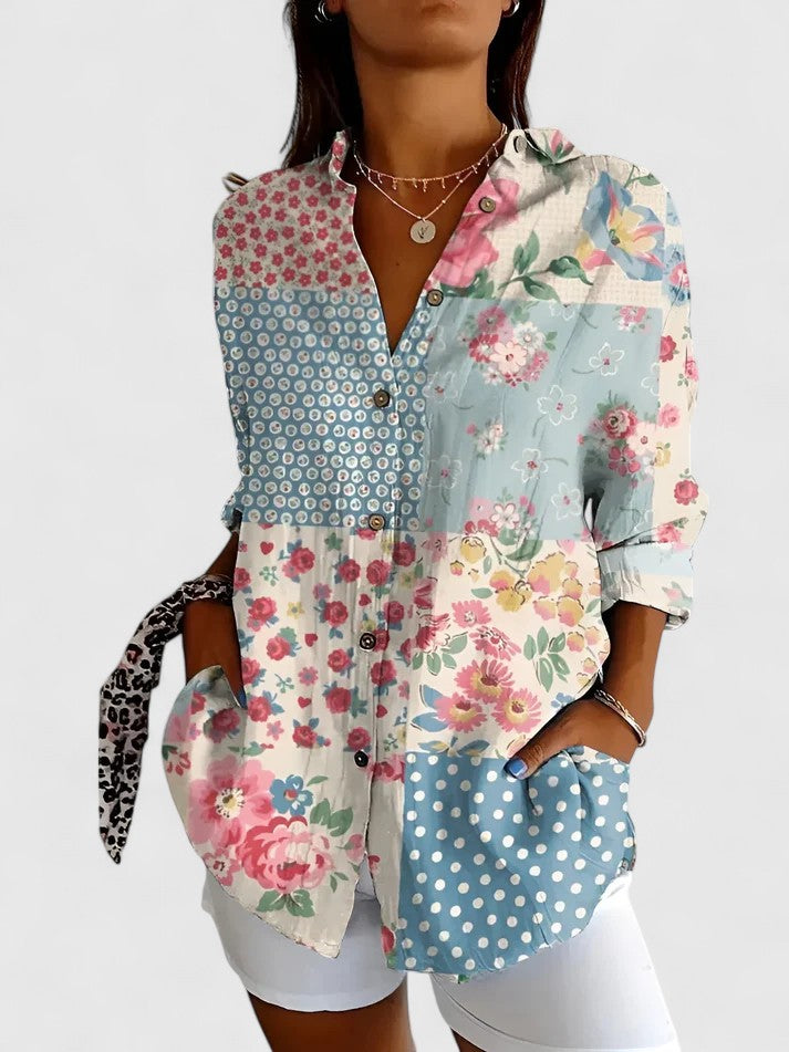 Elegant women's blouse from Isabel y Miguel Madrid, featuring a chic, stylish design with a fitted silhouette and sophisticated details.